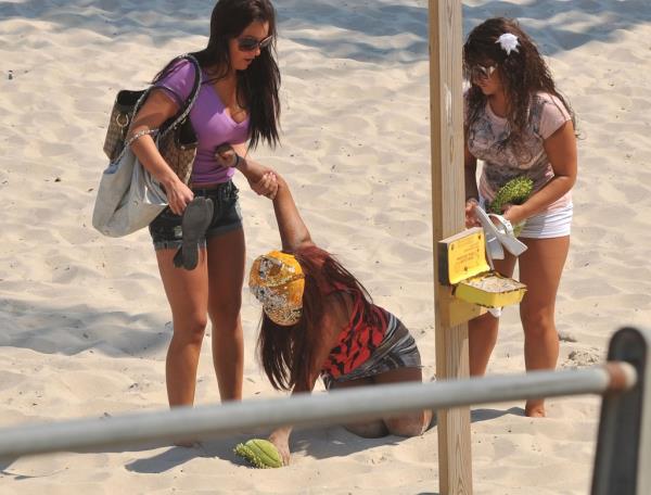 Denise Nicole Cortese, Nicole "Snooki" Polizzi; and Jenni "JWoww" Farley filming on location for "Jersey Shore" on July 30, 2010 in Seaside Heights, New Jersey.